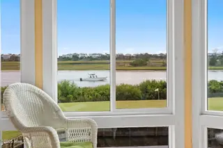 1916 Inlet Village Circle SW Unit 3a, Ocean Isle Beach, NC 28469 — 2-bedroom condo in Inlet Wacche, Ocean Isle Beach, NC, photo 16 of 38: Sunroom