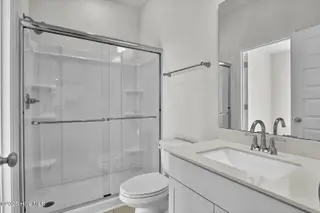 6825 Fellowship Drive, Leland, NC 28451 – photo 15: Downstairs Guest Suite Bathroom