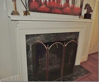 131 Ripley Road NW, Wilson, NC 27893 — 4-bedroom home in Recreation Park, Wilson, NC, photo 10 of 53: 9 LR Fireplace