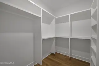 82 Northeast Drive NW, Calabash, NC 28467 – photo 16: 82NE Master bedroom closet with custom s