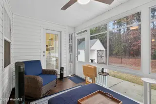2712 Winding Ridge Drive W, Wilson, NC 27893 – photo 13: Enclosed Porch