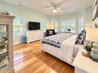 301 Wisteria Way, Caswell Beach, NC 28465 – photo 20: BR Primary 2