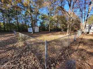 119 Edgewater Lane, Richlands, NC 28574 — 2-bedroom manufactured home in Chapel Ridge, Richlands, NC, photo 6 of 34: Fenced Backyard