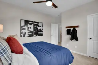 1218 Sunwater Terrace, Leland, NC 28451 — 4-bedroom townhome in Grand Park, Leland, NC, photo 24 of 49: Bedroom 2 - Hyacinth BE - Grand Park