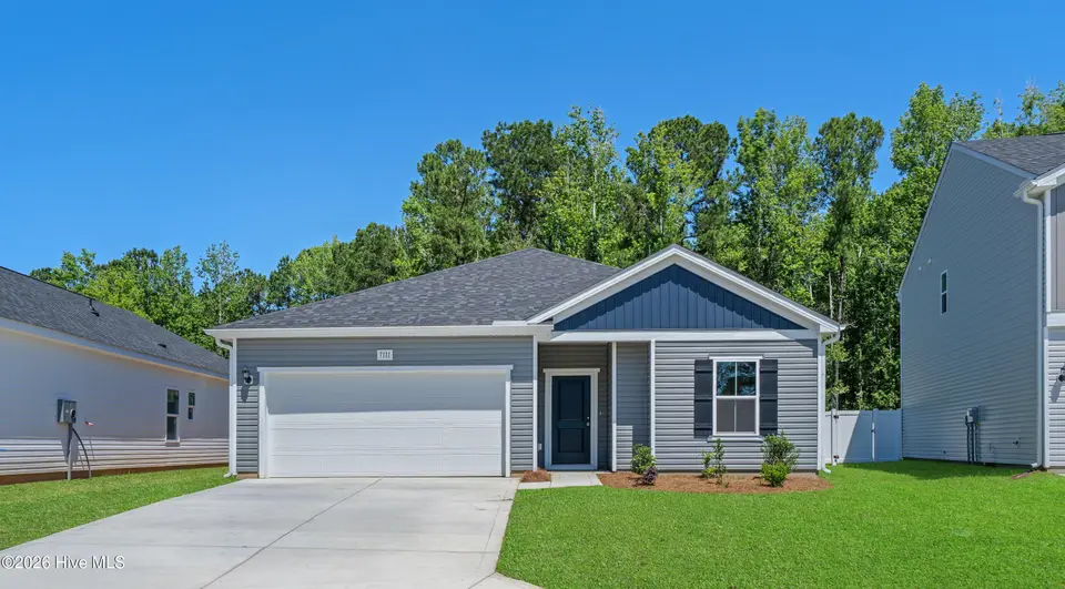 7111 Woodline Drive SW, Sunset Beach, NC 28468 – photo 1 of 40