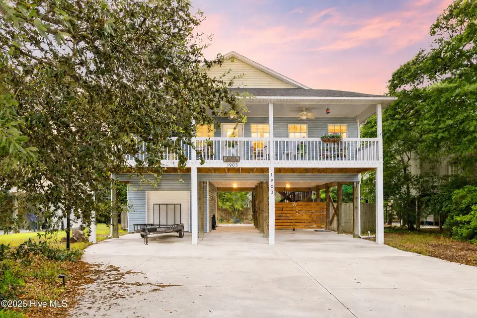 1903 E Oak Island Drive, Oak Island, NC 28465 – photo 1 of 50: 1_virtual twilight
