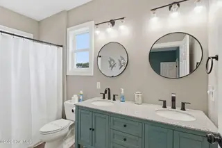 5205 E Pelican Drive, Oak Island, NC 28465 – photo 11: 14-web-or-mls-DSC06673
