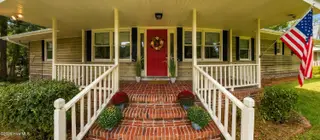 306 Shore Point Drive, Wilmington, NC 28411 — 4-bedroom home in Bayshore Estates, Wilmington, NC, photo 4 of 78: ShorepointDr-11 front door