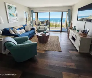 8801 Reed Drive W302, Emerald Isle, NC 28594 — 2-bedroom condo in Sound Of The Sea, Emerald Isle, NC, photo 2 of 17: Living Room