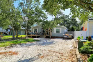 206 NE 51st Street, Oak Island, NC 28465 – photo 1: B_3V6A6504Y