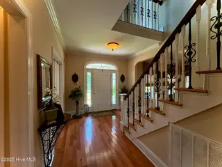 25 Muirfield Drive, Whiteville, NC 28472 – photo 12: Foyer and hallway to kitchen