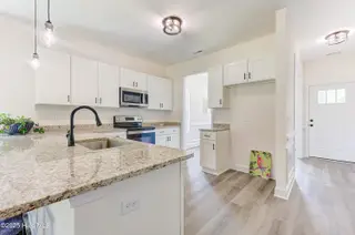 544 Timbercrest Circle SE, Bolivia, NC 28422 – photo 10: 520 Timbercrest Circle-print-014-030-Kit