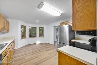 106 Heiress Wynd Drive, Jacksonville, NC 28546 — 3-bedroom home in Northside, Jacksonville, NC, photo 11 of 53: 11_kitchen