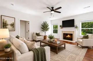 432 Bent Willow Drive, Clayton, NC 27527 – photo 7: Staged Living Room
