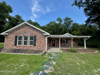 1043 High Point Avenue SW, Calabash, NC 28467 — 3-bedroom home in Calabash Acres, Calabash, NC, photo 1 of 7: Front