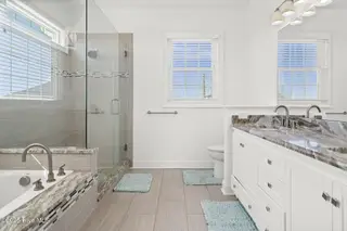 1318 N New River Drive, Surf City, NC 28445 – photo 9: Master Suite Double vanity