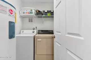 1125 S Topsail Drive, Surf City, NC 28445 – photo 15: Laundry Closet