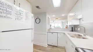 8801 Reed Drive 115, Emerald Isle, NC 28594 – photo 9: Kitchen w/ Water Views