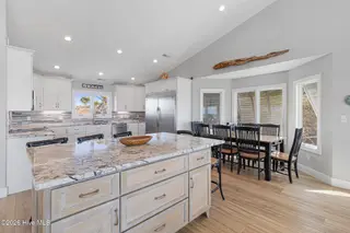 217 Salter Path Road, Pine Knoll Shores, NC 28512 – photo 19: Kitchen with Island Seating