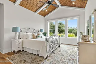 9279 Devaun Pointe Circle, Calabash, NC 28467 – photo 12: Primary suite w/view of marsh