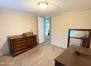 4905 Hunting Ridge Road NW, Wilson, NC 27896 — 3-bedroom manufactured home in Windemere, Wilson, NC, photo 12 of 16: Bedroom2