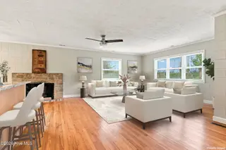 395 Nelson Neck Road, Sea Level, NC 28577 – photo 7: 15-web-or-mls-Living Room (2)
