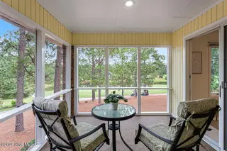 71 Deerwood Lane, Pinehurst, NC 28374 – photo 20: Screened Porch with golf front views