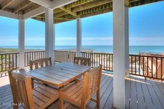 5103 W Beach Drive, Oak Island, NC 28465 – photo 10: 5103 W Beach Drive 9