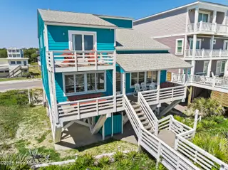 1123 E Beach Drive, Oak Island, NC 28465 – photo 5: mls-DJI_20250428105427_0107_D