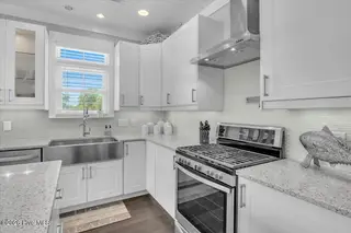 804 E Oak Island Drive, Oak Island, NC 28465 – photo 16: 18-Final 804 E Oak Island Dr-RJREM-0090