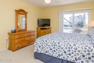 1131 S Shore Drive, Surf City, NC 28445 – photo 16: Streetside North King Bedroom II