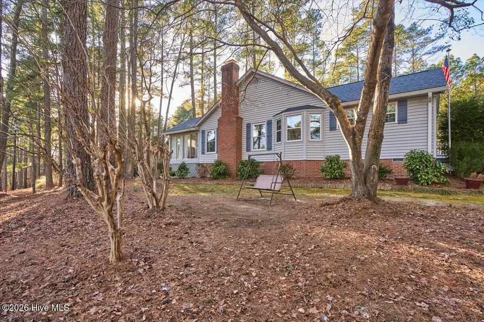 171 Pine Ridge Drive, Whispering Pines, NC 28327 – photo 1 of 65: front