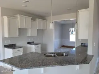 914 Nassau Court, New Bern, NC 28560 – photo 10: white cabinets