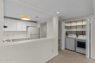 231 Saint Luke Court, Wilmington, NC 28409 — 2-bedroom waterfront townhome in Caneel Cove, Wilmington, NC, photo 15 of 38: 34-web-or-mls-BTS02049
