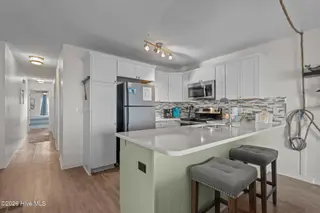 1225 Lake Park Boulevard S 1a, Carolina Beach, NC 28428 – photo 6: 53-web-or-mls-DSC04906