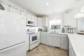 3929 W Dolphin Drive, Oak Island, NC 28465 – photo 11: shniderproductions.com-26