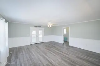 802 E Oak Island Drive, Oak Island, NC 28465 – photo 9: Family Room-016-028-1500x1000
