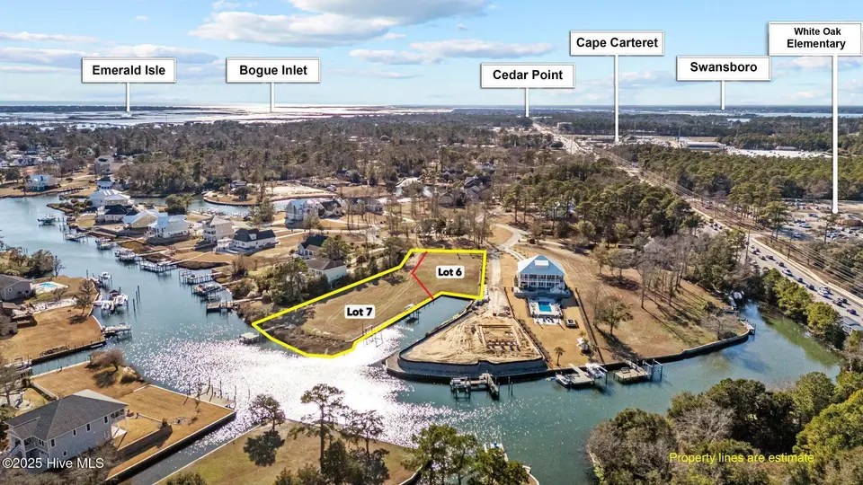 113 Cape Point Boulevard, Cape Carteret, NC 28584 – photo 1 of 32: 2-web-or-mls-DJI_20250217151653_0644_D_1