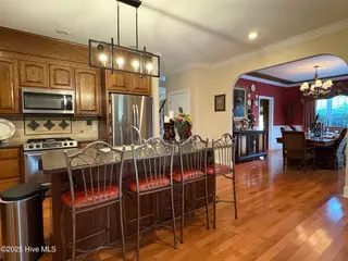 25 Muirfield Drive, Whiteville, NC 28472 – photo 19: Open floor plan with defined spaces