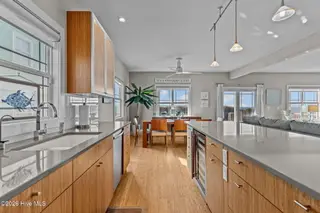 7403 E Beach Drive, Oak Island, NC 28465 – photo 7: Modern Finishes & Stainless Appliances