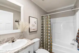 6745 Lewis Drive SE, Winnabow, NC 28479 – photo 23: Guest bathroom
