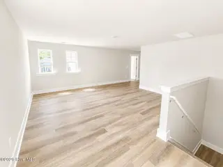8611 Blue Haw Way Lot 124, Leland, NC 28451 — 5-bedroom home in Indigo Preserve, Leland, NC, photo 14 of 33: Loft Area
