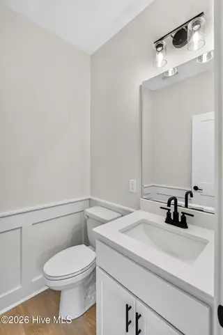 2303 Chestnut Street, Wilmington, NC 28405 — 3-bedroom home in Chestnut Heights, Wilmington, NC, photo 24 of 53: Downstairs Half Bathroom