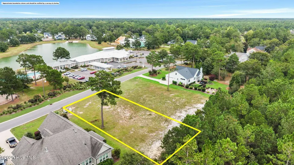 9500 195 Fallen Pear Lane NE, Leland, NC 28451 — lot in The Bluffs on the Cape Fear, Leland, NC, photo 1 of 41: 18_DJI_20260923162232_0853_D copy