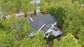 209 Longleaf Drive, West End, NC 27376 – photo 7: 8-web-or-mls-DJI_20260713114207_0717_D