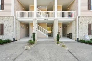 180 Clubhouse Road Apt 2, Sunset Beach, NC 28468 – photo 2: Front Ground