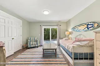 9936 Louise Howard Court East, Emerald Isle, NC 28594 — 3-bedroom townhome in Spinnakers Reach, Emerald Isle, NC, photo 5 of 32: Ground Floor Bedroom 4