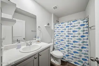 2028 Course Lane, Surf City, NC 28445 – photo 17: 27-web-or-mls-GI - 2028 Course Ln - List