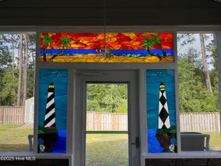 122 Ballantine Grove Lane, Newport, NC 28570 – photo 7: Back Porch Stained Glass