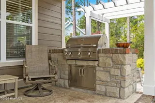 2585 Parkridge Drive, Southport, NC 28461 — 4-bedroom home in St James, Southport, NC, photo 7 of 77: Artisan Outdoor Grill Conveys
